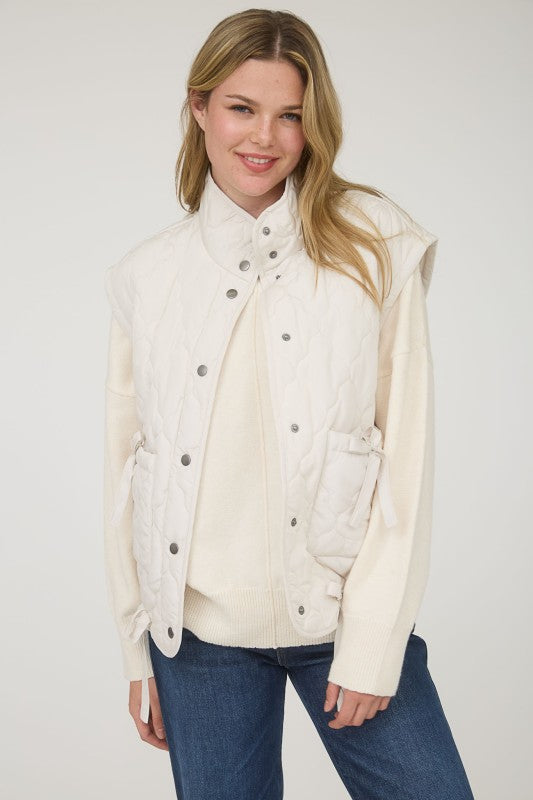 Quilted Puffer Vest With Bow Details - Champagne