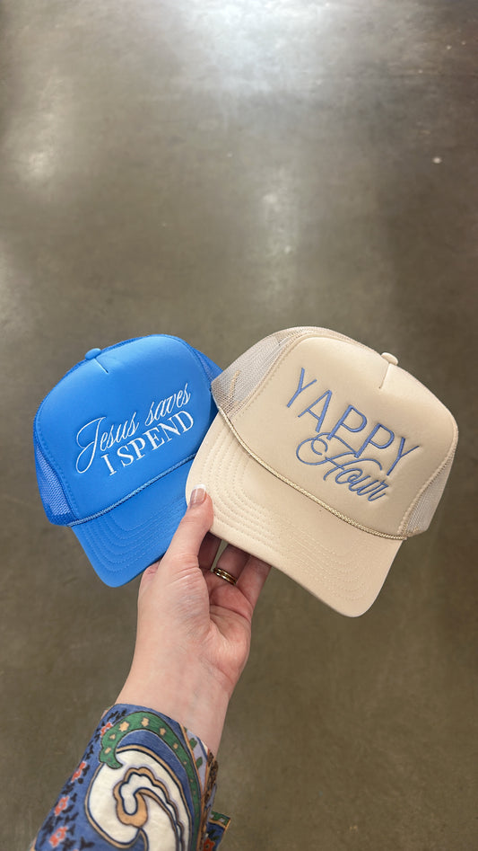 “Jesus Saves I Spend” Trucker Hat